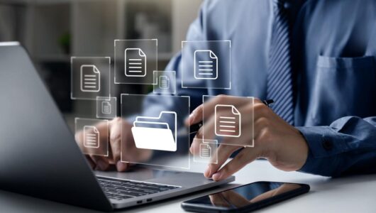 businessman-pointing-folder-document